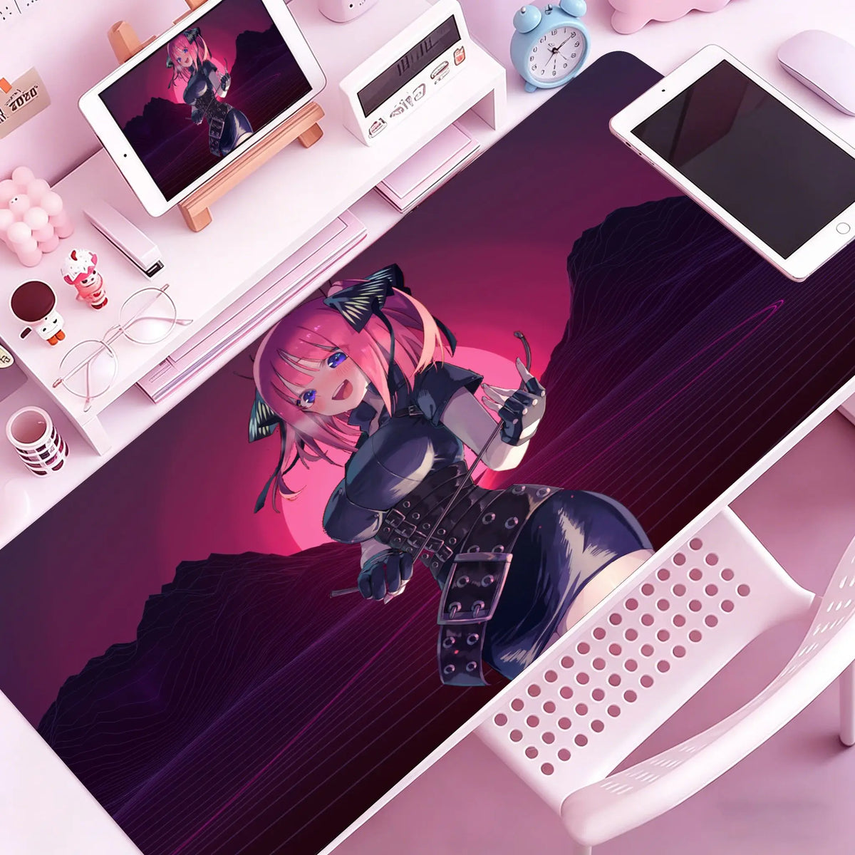 A vibrant anime character illustration on a pink mouse pad featuring a purple-haired girl in dark clothing.