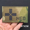 A rectangular olive green tactical patch featuring a black medical cross symbol and the letters MED on a hand.