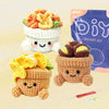 A set of crochet kits featuring cute animal and plant projects, including a white flower and a brown animal.