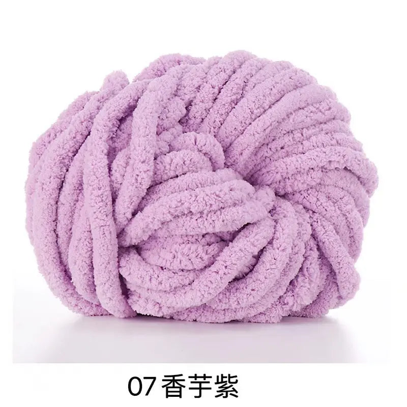 A ball of fluffy light purple acrylic yarn for knitting and crochet