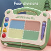 A light green magnetic drawing board for kids with four divisions and a purple eraser pen.
