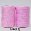 Two spools of pink 3-ply polyester knitting yarn for crochet and hand crafts
