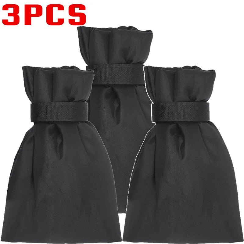 Three black faucet insulation covers or anti-freeze protectors for outdoor taps