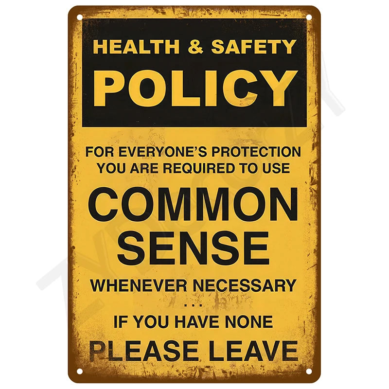 A vintage metal tin sign with yellow background and black text instructing to use common sense or leave.