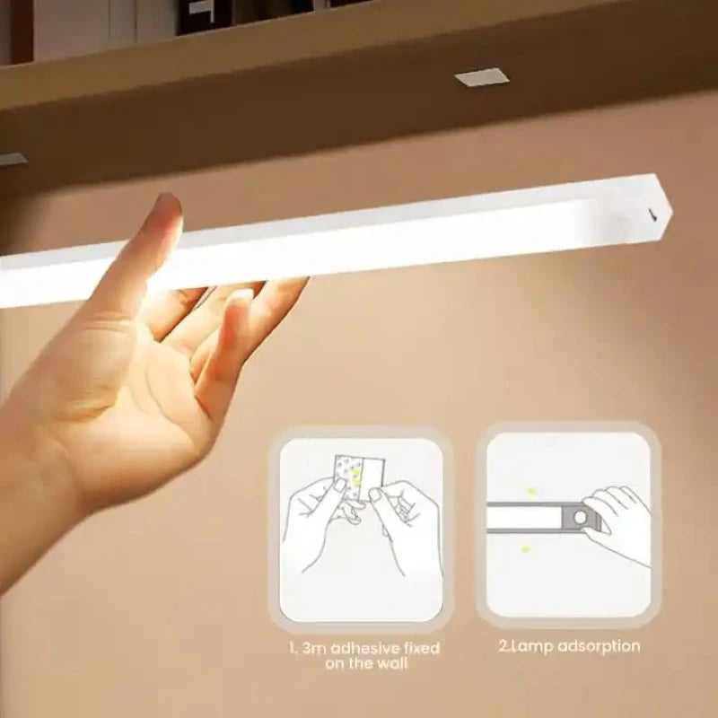 Hand placing a white LED light strip onto a wall, demonstrating adhesive fixing and lamp adsorption.
