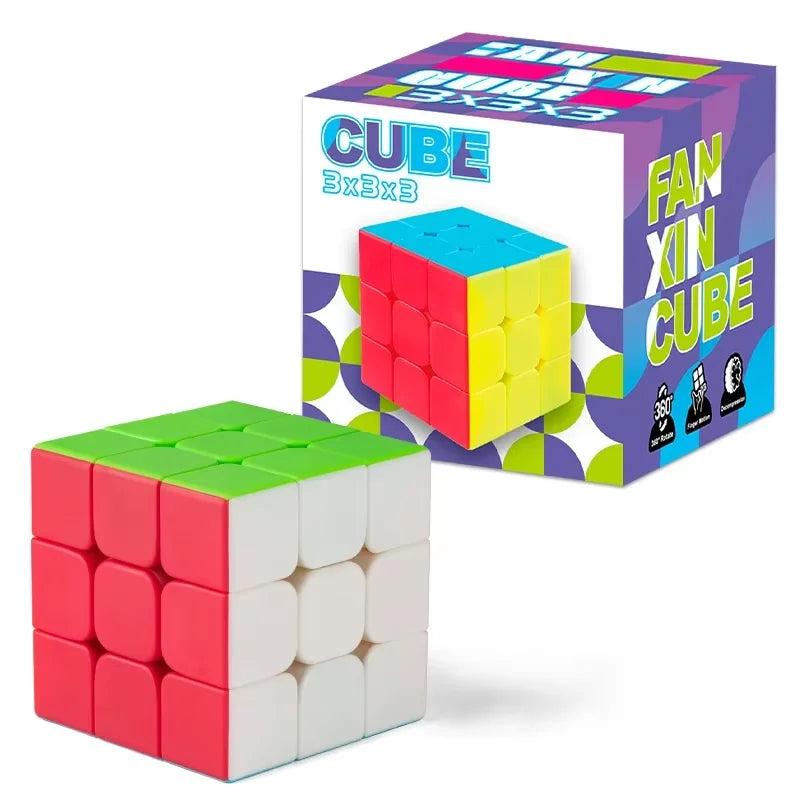 A pink and white cube puzzle is shown next to its packaging box.