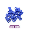 A pile of dark blue plastic side-release buckles for paracord bracelet projects.