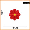 A single red rose embroidered iron-on patch with a yellow center.