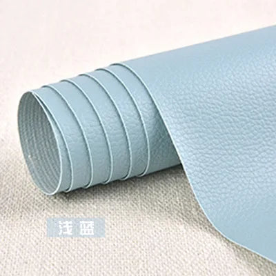 A roll of light blue self-adhesive PU leather patch for furniture and craft repairs.