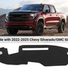 A custom fit black dash cover mat for a Chevy Silverado or GMC Sierra truck.