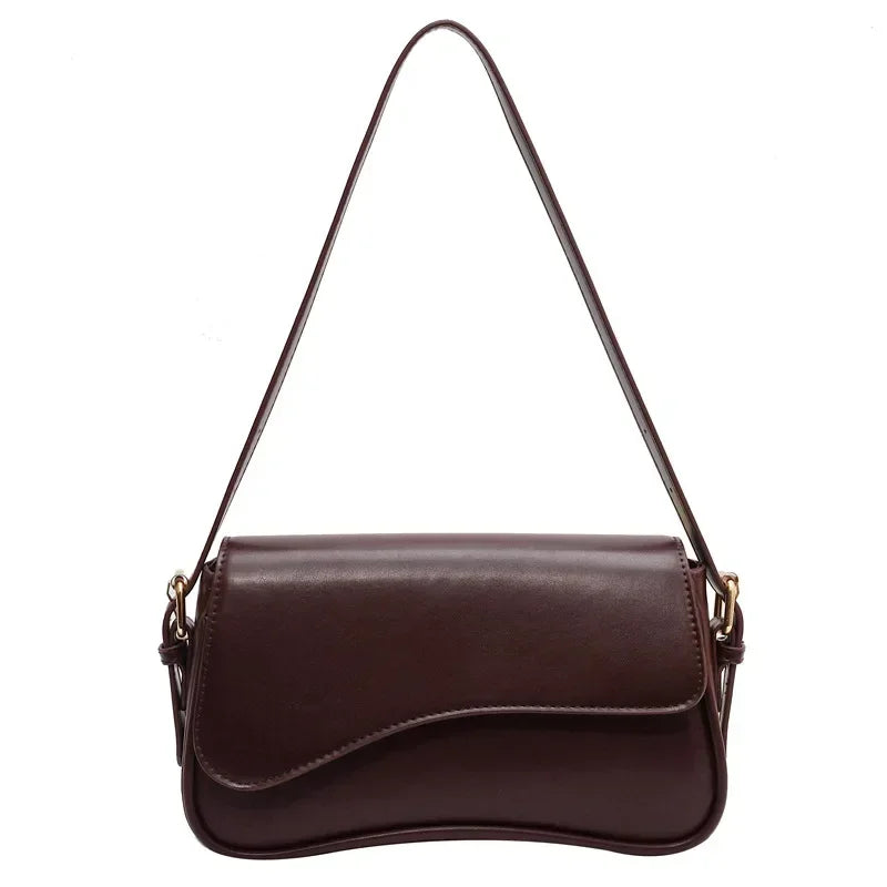 A dark brown vintage leather crossbody bag with a flap closure.