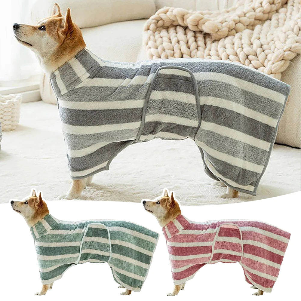 A fluffy dog wearing a striped bathrobe, shown in two different colors, lying on a white surface.