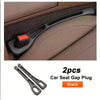 A pair of black car seat gap plugs with grooves shown in a vehicle interior context.