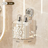 A clear wall-mounted storage basket with a water ripple design holds two glass bottles and a metal cap.