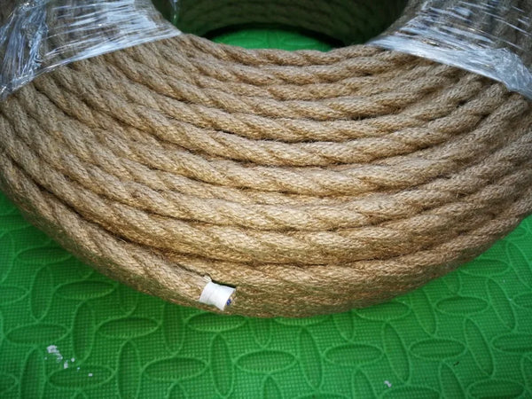 A close-up view of a thick, braided natural fiber cord wrapped in clear plastic, used for a pendant light.