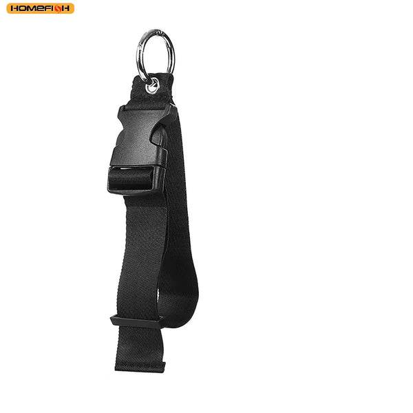 Black adjustable travel luggage strap and belt with a metal ring for securing items