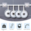 Silver curtain rod hooks with 5kg capacity and adhesive mounts for no-drill wall installation