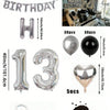 A kit for creating a balloon garland featuring silver and black foil numbers and balloons.