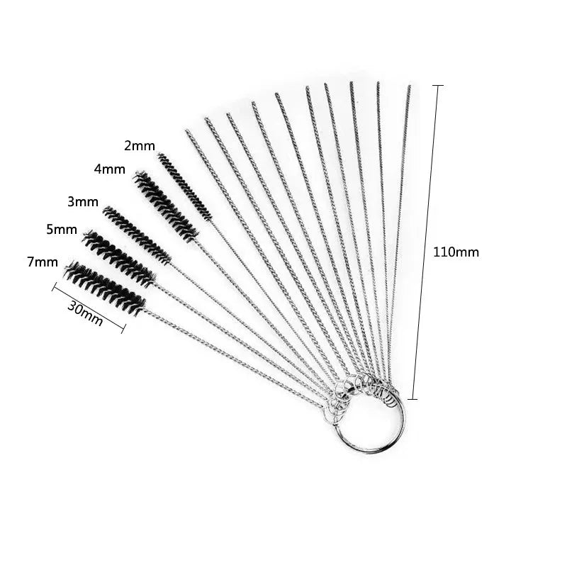 A set of carburetor cleaning tools including various sized jet needles and brushes with labeled dimensions.