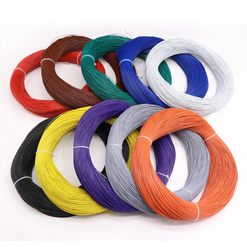 A collection of various colored tinned copper hook-up wire spools in PVC insulation.
