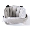 Gray car seat head support strap designed for sleeping children.