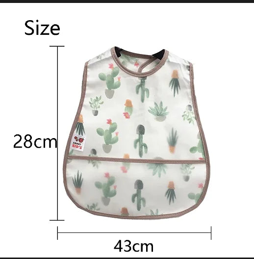 A white baby feeding bib featuring a pattern of green cacti and a pink trim.