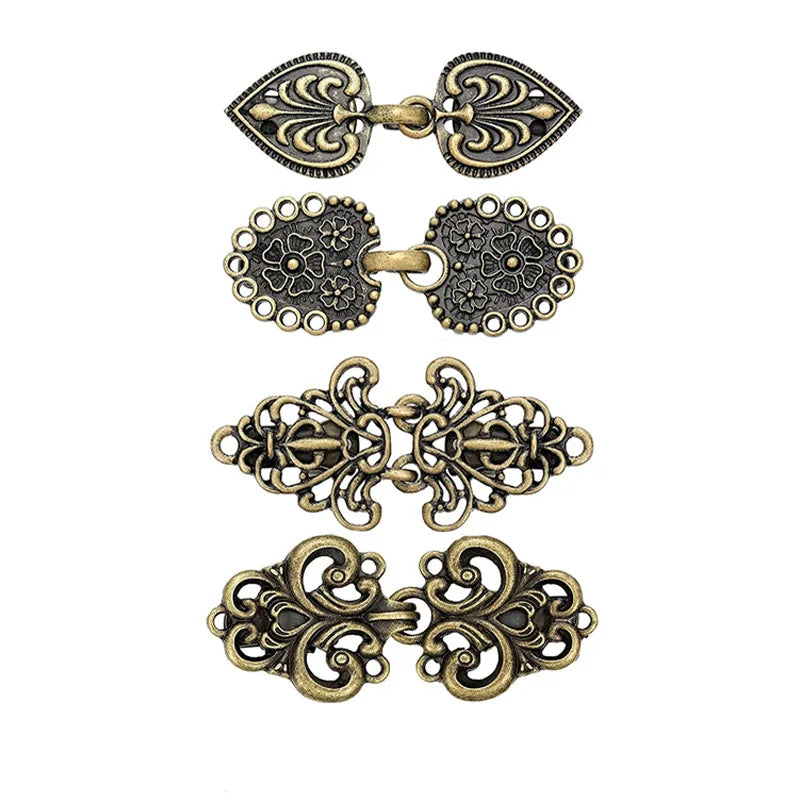 Vintage rotating sweater clips for cardigans and shawls in antique gold finish
