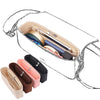 A clear acrylic felt bag organizer with multiple internal pockets and a hinged lid.