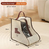 A beige waterproof boot storage bag with a handle is shown on a light rug.