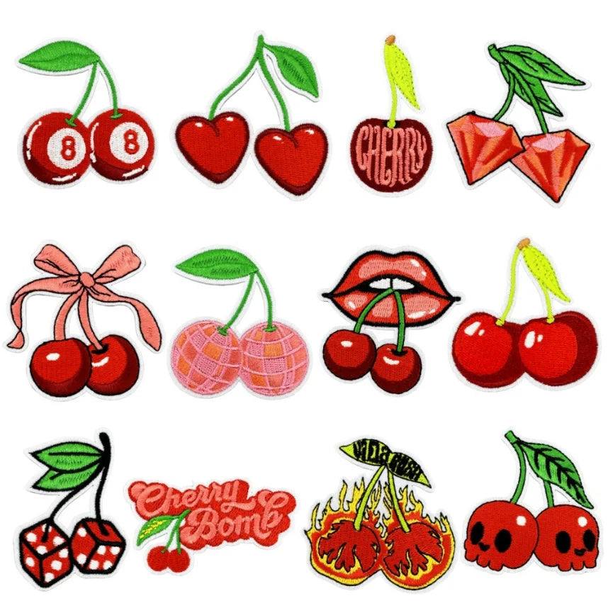 A collection of ten embroidered cherry iron-on patches in various colors and designs.