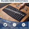 A black Oxford fabric tool bag with multiple pockets is shown on a wooden surface next to wrenches.