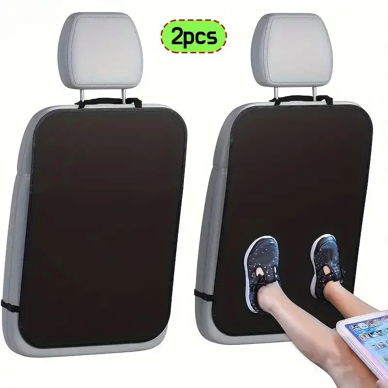 Two black car seat back kick protectors shown with a foot inserted for demonstration.