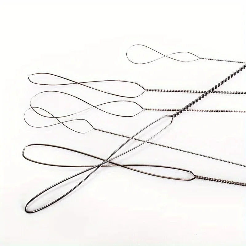 A collection of flexible stainless steel bead needles used for jewelry making