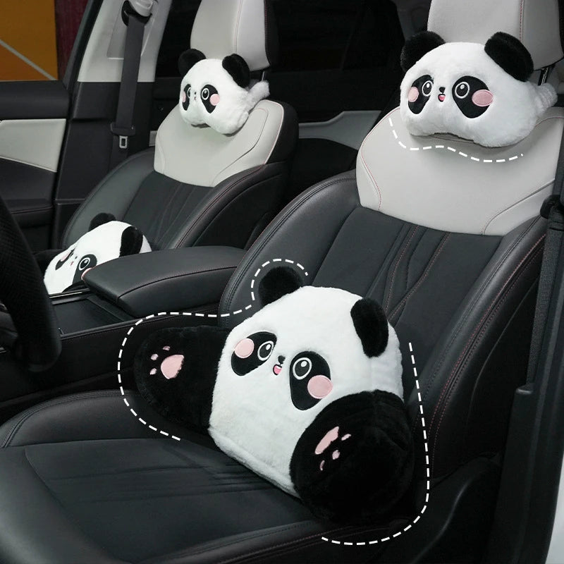 Black car seats with white panda plush headrests and lumbar support cushions
