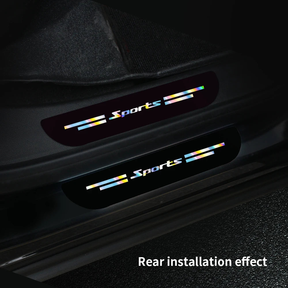 Close-up of black car door sill protector strips with a sports theme decoration.