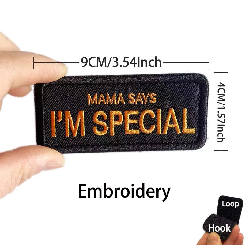 Black embroidered patch that says Mama Says I'm Special with measurements provided