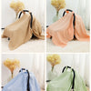 Three variations of breathable cotton muslin car seat and stroller covers in beige, peach, and light green.