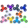 A collection of colorful smooth-spin fidget spinners in various colors including red, purple, black, blue, orange, and green.