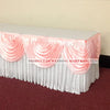 Elegant ice silk table skirt with matching top swag in pink and white for a wedding display.