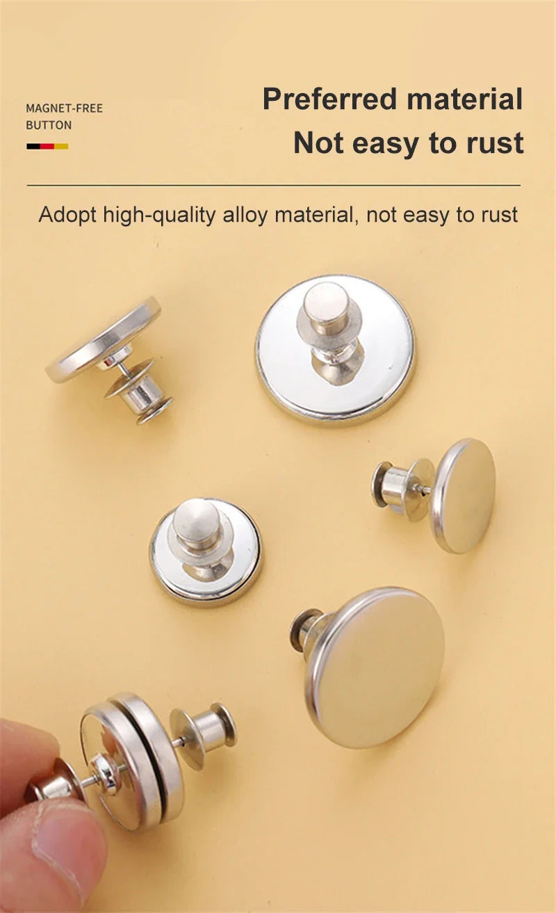 A collection of magnetic curtain clips in silver and gold tones shown against a light yellow background.