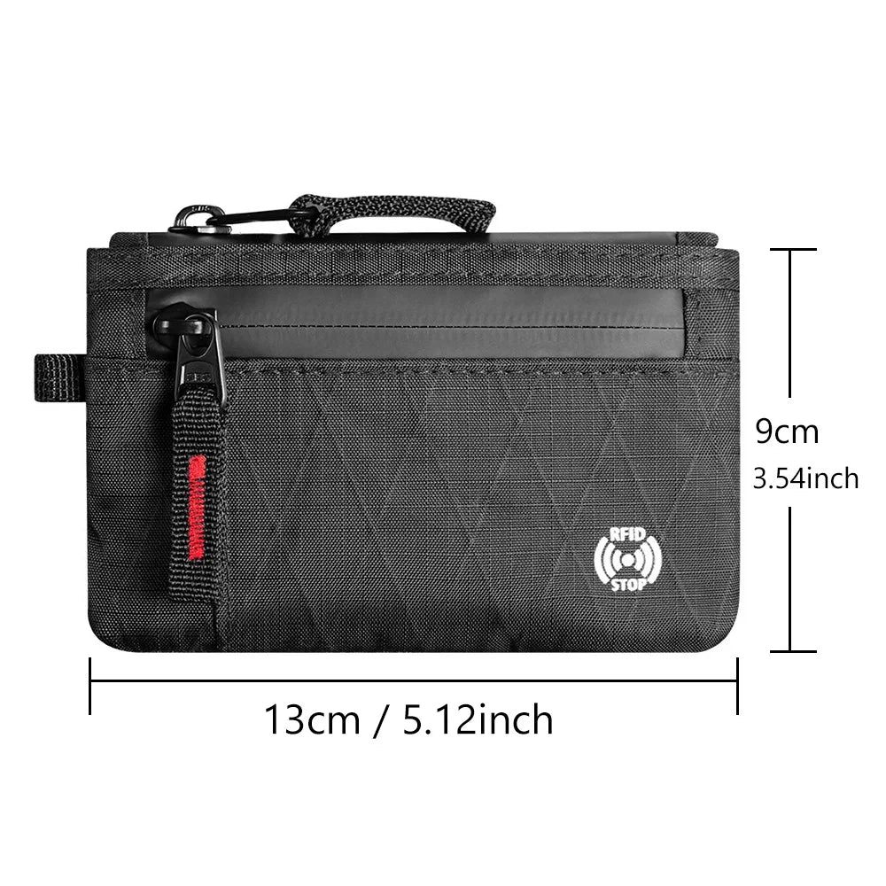 Black RFID-blocking travel wallet with a carabiner clip shown flat.