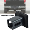 Black trailer hitch cover designed to protect the receiver plug of a vehicle.