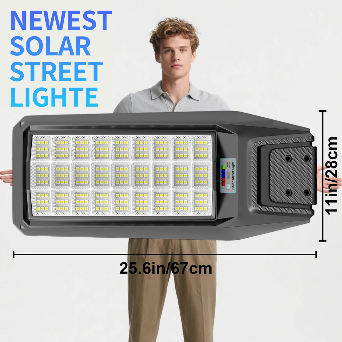 A man holds a newest solar street light, a rectangular outdoor security light with multiple LED panels.