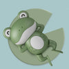 A green musical bubble maker bath toy shaped like a frog sitting on a light green background.
