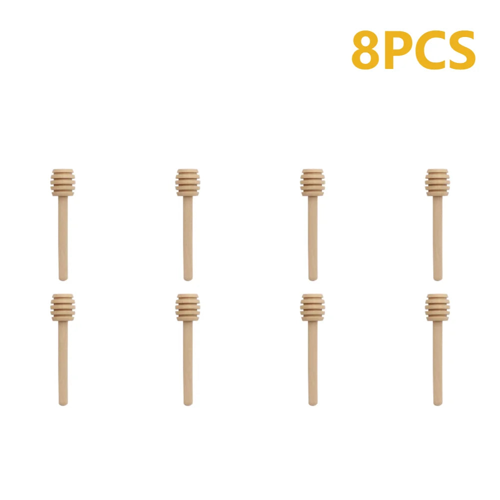 Eight natural wood honey dipper sticks displayed individually.