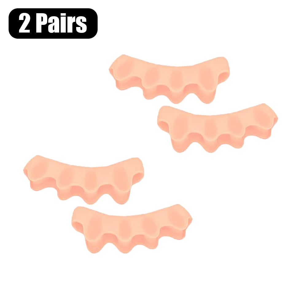 Two pairs of soft silicone toe separators for foot alignment and bunion relief.