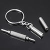 Silver nose pads and a mini screwdriver attached to a metal ring for glasses repair