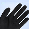 Close-up view of a black palm-coated winter glove showing the texture and fit.