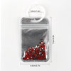 A clear plastic storage bag with a seal, filled with red and black glitter, shown next to a measurement ruler.