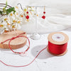 Red nylon cord for jewelry making with beads and a hanging display stand